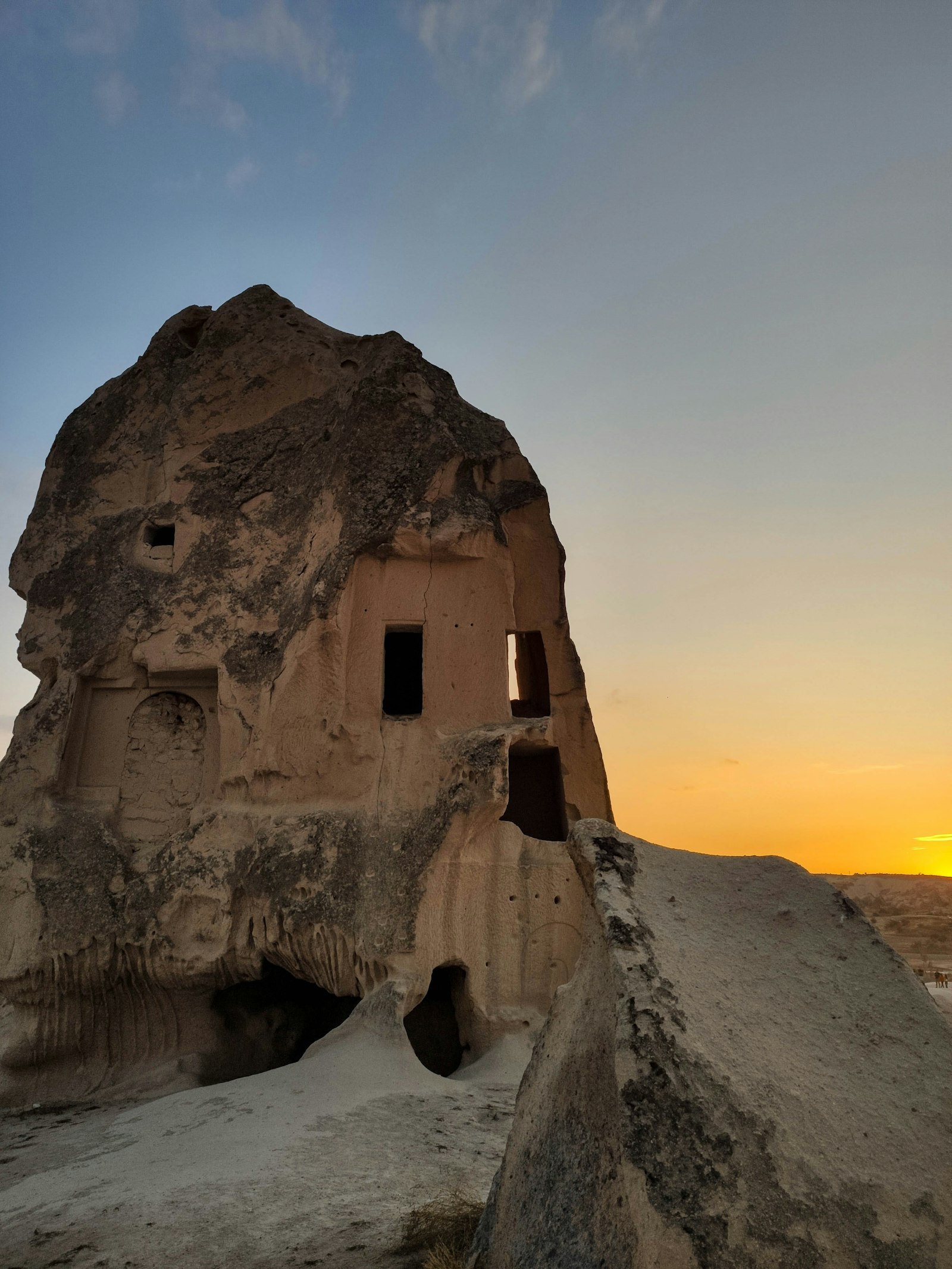 Ancient cave dwelling carved into Cappadocia rock formations
